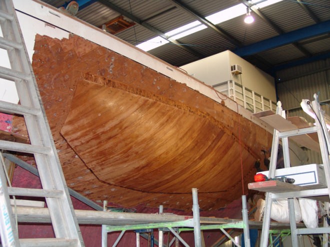 Six skins of African mohogany are being laid and held in place with temporary fastenings. © Richard Gladwell www.photosport.co.nz
