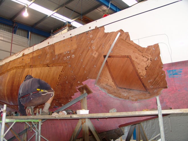 The reskinning of the hull is well advanced, this shot shows the forward section of the repair area.. © Richard Gladwell www.photosport.co.nz