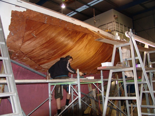 The aft repair area is being cleaned up in preparation for the fifth skin. The woarm glow of the African Mahogany looks too good to paint! © Richard Gladwell www.photosport.co.nz