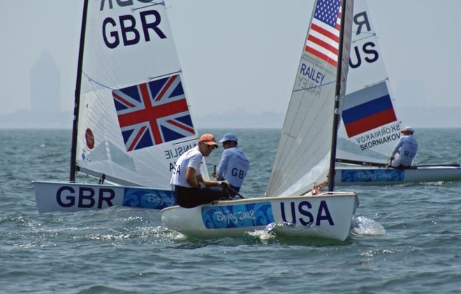 Zach Railey (USA) leads Ben Ainslie (GBR), early in the 2008 Olympic Regatta in the Finn class © Richard Gladwell www.photosport.co.nz