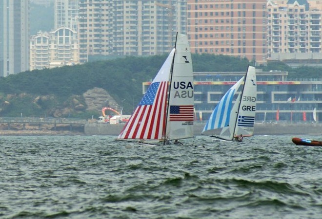 2008 Olympic Regatta - Day 7 - the USA Tornado to leeward with the new Code Zero spinnaker. Racing was abandoned before the start. © Richard Gladwell www.photosport.co.nz