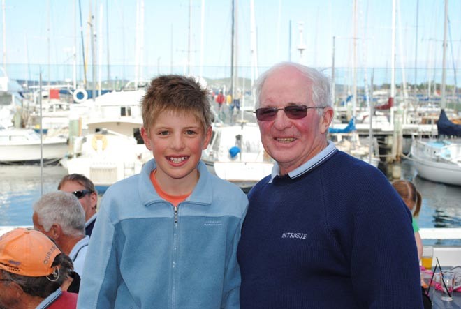 Don Calvert and grandson Jock Calvert at the Royal Yacht Club of Tasmania after The Showdown Regatta prizegiving on Sunday.  Don won the IRC <br />
division of Division 1, Jock finished a close fifth in the Sabot class and <br />
is likely to make the team for the nationals ©  Andrea Francolini Photography http://www.afrancolini.com/