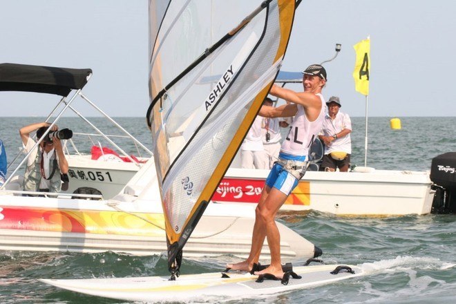 Tom Ashley crosses the finish line (RS:X Mens Medal Race) © Richard Gladwell www.photosport.co.nz