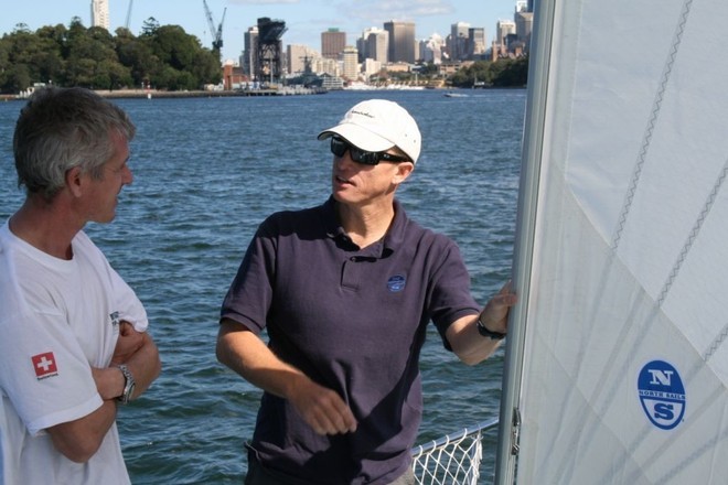 Alby Pratt and Dario discussing sail set up during commissioning of new sails on Pachamama (Photographer - Julian Plante) © North Sails http://www.northsails.com/