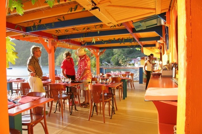 Colourful restaurant, food and people are features of the Caribbean &copy; Mariner Boating Holidays http://www.marinerboating.com.au