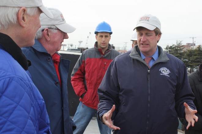 Congressman Patrick Kennedy (D-R.I.) meets with Perry Lewis (l) and Bart Dunbar, vice-chair and chair, respectively, of the  Oliver Hazard Perry Rhode Island organization, during a visit to Promet Marine Services in Providence, where the hull of Rhode Island’s Tall Ship Oliver Hazard Perryis currently dry-docked for work and various inspections. Promet’s Yard Administrator Michael Cohen (background) was among the shipyard workers who also spoke with Kennedy as he learned about the opportunities  © Oliver Hazard Perry Rhode Island (OHPRI) http://www.ohpri.org
