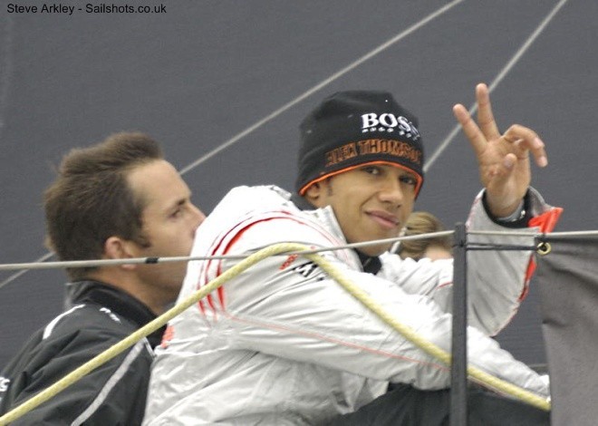 Formula 1 Racing driver Lewis Hamilton on board Hugo Boss © Steve Arkley http://www.sailshots.co.uk