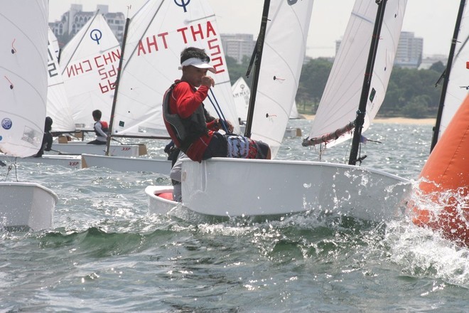 Navee Thamsoontom (THA), presently leading the IODA Optimist Asian Championships in Singapore © SingaporeSailing