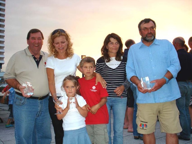 (left to right): Bill Tyler, Marian Jankowski’s daughters Anna and Magda, Norbert Petrausch - OK Dinghy Hall of Fame 2008 © OKDIA.org http://www.okdia.org
