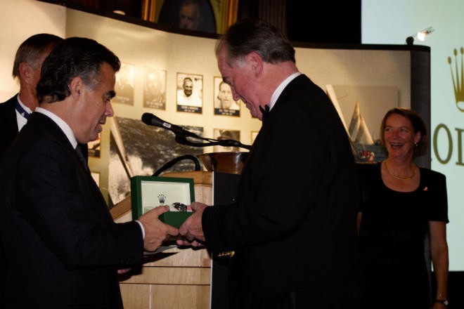 Allen Brill (President & CEO Rolex Watch U.S.A.), presents a Rolex timepiece to raffle winner Alfred Bissett  © Kimberly Holcombe/Rolex