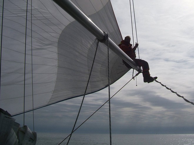 Uniquely Singapore’s Jurgen prepares to spike the spinnaker  - Clipper 07-08 © Clipper Ventures PLC . http://www.clipperroundtheworld.com