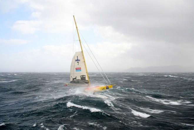 Bernard Stamm struggles in the storm on the first day of the Velux 5 Oceans Race © onEdition http://www.onEdition.com