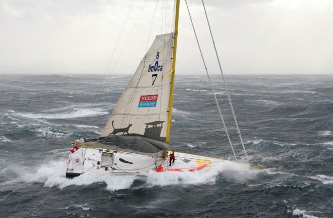 Bernard Stamm struggles in the storm on the first day of the Velux 5 Oceans Race © onEdition http://www.onEdition.com