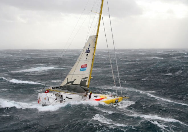 Bernard Stamm struggles in the storm on the first day of the Velux 5 Oceans Race © onEdition http://www.onEdition.com