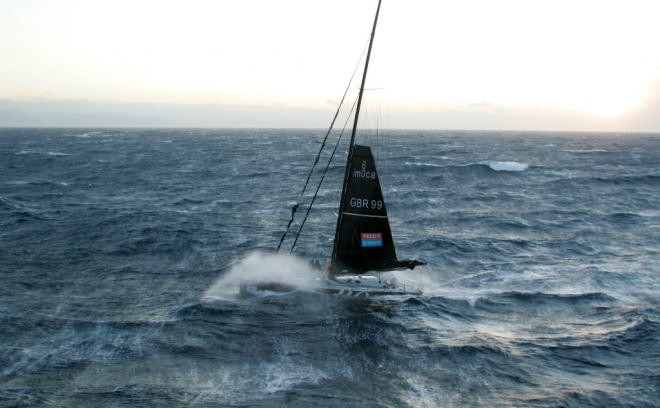 Alex Thompson runs for a safe port in the Velux 5 Oceans race © onEdition http://www.onEdition.com