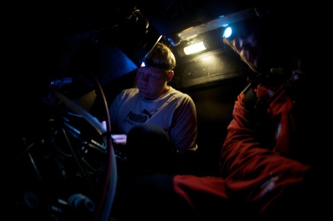 Casey Smith and Andrew Cape in the engine box, onboard PUMA Ocean Racing, on leg 5 of the Volvo Ocean Race, from Qingdao to Rio de Janeiro © Rick Deppe/PUMA Ocean Racing/Volvo Ocean Race http://www.volvooceanrace.org