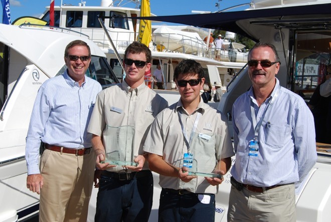 Celebrating victory – Director of Operations John Anderson (left) and General Manager of New Product Development Phil Candler with Riviera apprentices and the Boat Of The Year Trophies at the Sanctuary Cove Boat Show. © Riviera . http://www.riviera.com.au
