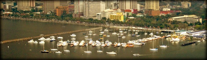 Manila Yacht Club. Not a lot of masts... © George Layton