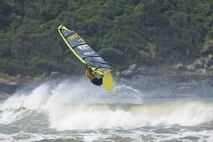 Angulo cracks an aerial - 2007 Mormaii Ibiraquera Wave Contest / PWA World Cup – Mormaii Super Session photo copyright  John Carter / PWA http://www.pwaworldtour.com taken at  and featuring the  class