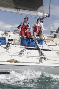 Cadi with John steering and son David photo copyright Teri Dodds http://www.teridodds.com taken at  and featuring the  class