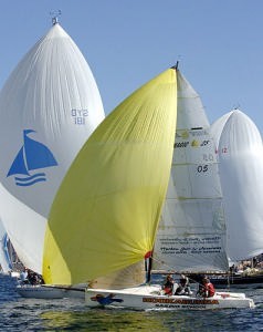 One of the two Kookaburra Sailing School's Kookaburra Sailing in the shadow of David Todner's Berani VII and Selby and Wise's Cyrene 3 photo copyright Peter Andrews http://www.outimage.net taken at  and featuring the  class