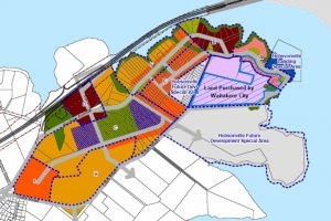 Hobsonville, the new land acquired by Waitakare City is in light purple on the right, existing and new suburbs and schools on the left. photo copyright Star PR www.starpublicrelations.co.nz taken at  and featuring the  class