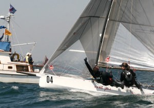 Crew Trevor Baylis, with wife Tina driving, celebrates clinching second place in the I-14 Worlds photo copyright Rich Roberts http://www.UnderTheSunPhotos.com taken at  and featuring the  class