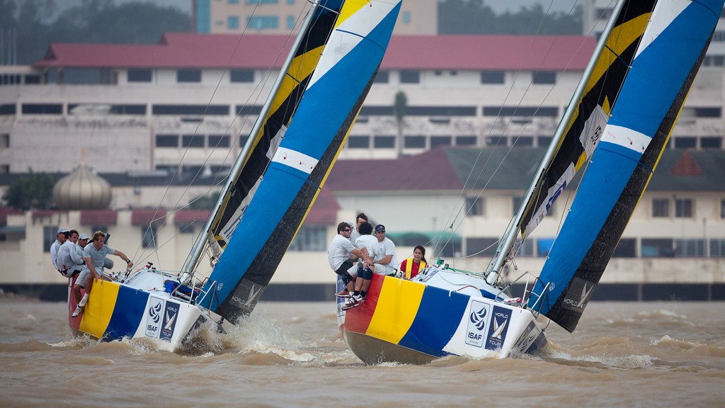 Damien Lehl (FRA) leading Francesco Bruni (ITA) to the top mark. Monsoon Cup 2009. Kuala Terengganu, Malaysia. 3 December 2009. Photo: Sander van der Borch / Subzero Images © Gareth Cooke Subzero Images/Monsoon Cup http://www.monsooncup.com.my