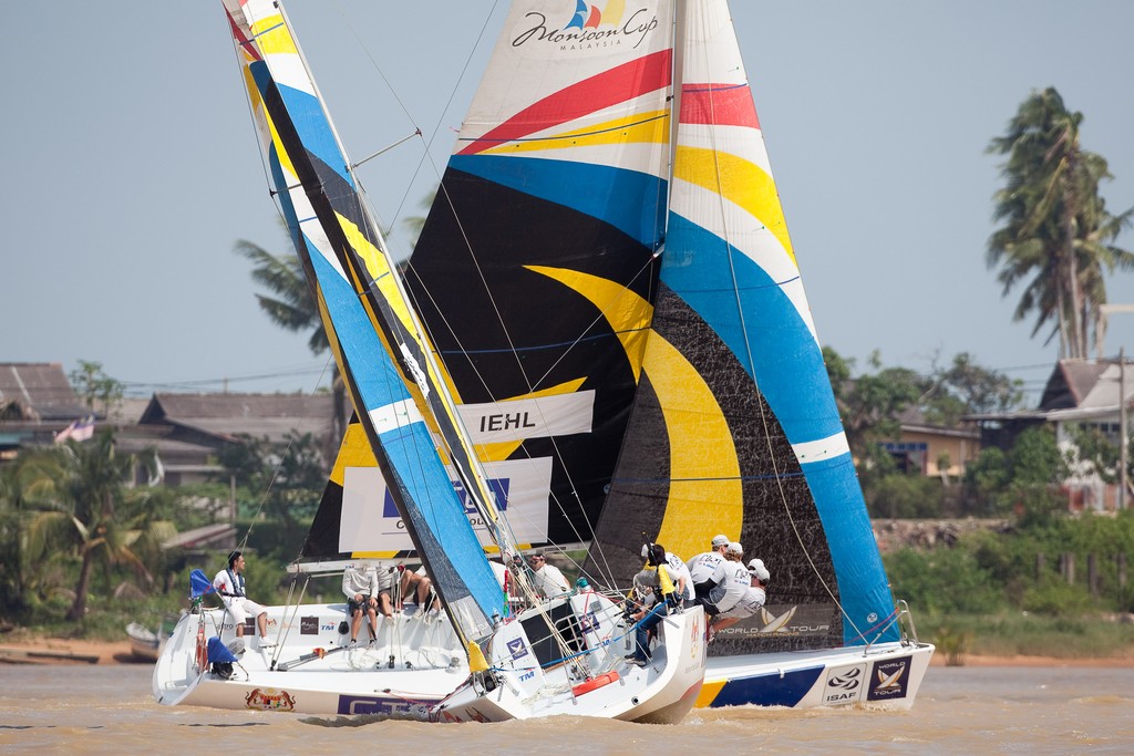 Damien Lehl (FRA) crossing Phil Robertson (NZL). Monsoon Cup 2009. Kuala Terengganu, Malaysia. 4 December 2009. Photo: Sander van der Borch / Subzero Images © Gareth Cooke Subzero Images/Monsoon Cup http://www.monsooncup.com.my