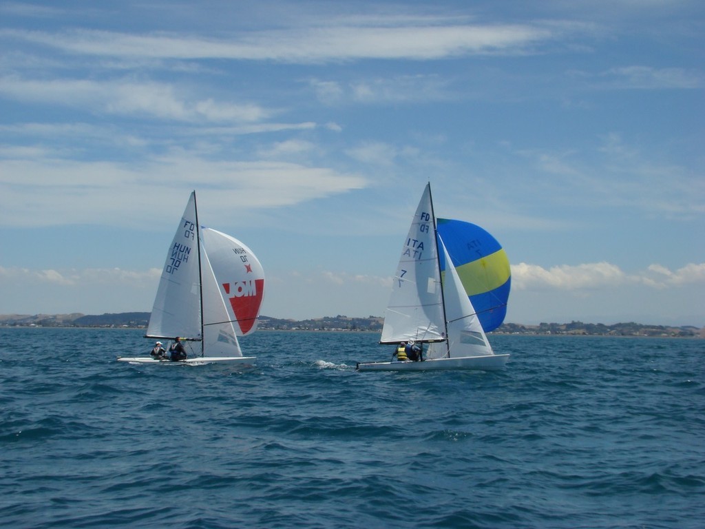 Reagtta Leaders (Hun 70) chasing IFDCO President Alberto Barenghi in race 1. Day 1 - Flying Dutchman Worlds, Napier © Kevin Hayton