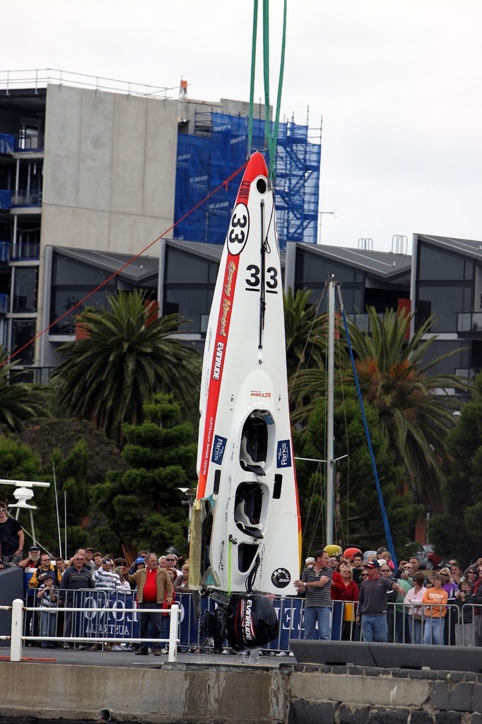Grumpy Mongrel hauled from the water after crashing mid-race - Offshore Superboat Championships Round Four at Geelong photo copyright Greg Maunder http://www.gregmaunder.com taken at  and featuring the  class