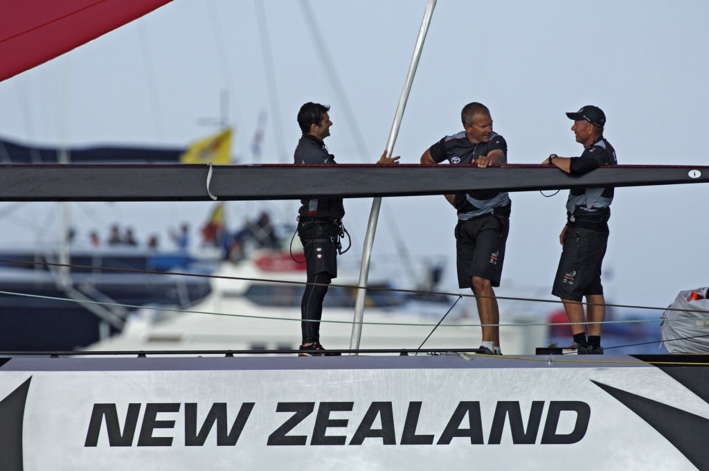 Emirates Team New Zealand sailors Jeremy Lomas, Matt Mason and Grant Dalton appear to have a relaxed chat on the foredeck of NZL92 just after their win against Mascalzone Latino ITA99 in their Round Robin two match of the Louis Vuitton Cup. © Emirates Team New Zealand / Photo Chris Cameron ETNZ 
