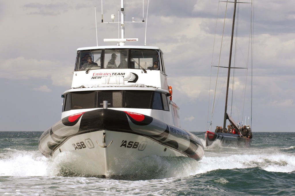 Emirates Team New Zealands Tender ASB1 tows NZL92 back into the port Americas Cup after racing was cancelled because there was too much wind. photo copyright Emirates Team New Zealand / Photo Chris Cameron ETNZ  taken at  and featuring the  class