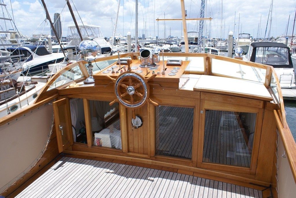 The classic, open bridge aboard Megsie with the traditional ship's wheel. Up here one really feels like a captain. - symphony in wood photo copyright SW taken at  and featuring the  class