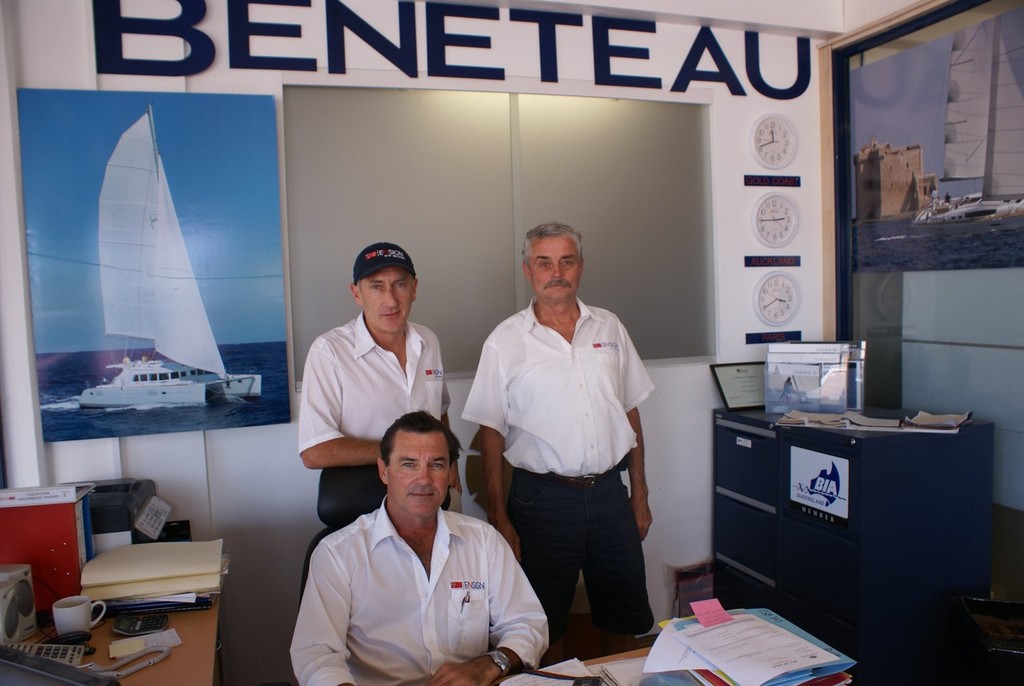 Ensign Ship Brokers management, Tony Ross (left) and Peter Moloney (right), standing with the sailing division’s sales manager Colin Maslen. © Bob Wonders