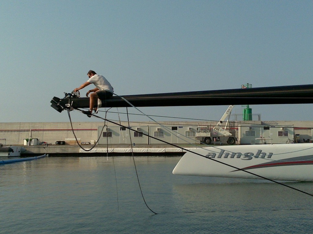 Working on the bowsprit on Alinghi 5 in Genoa Italy photo copyright Alinghi Team www.alinghi.com taken at  and featuring the  class