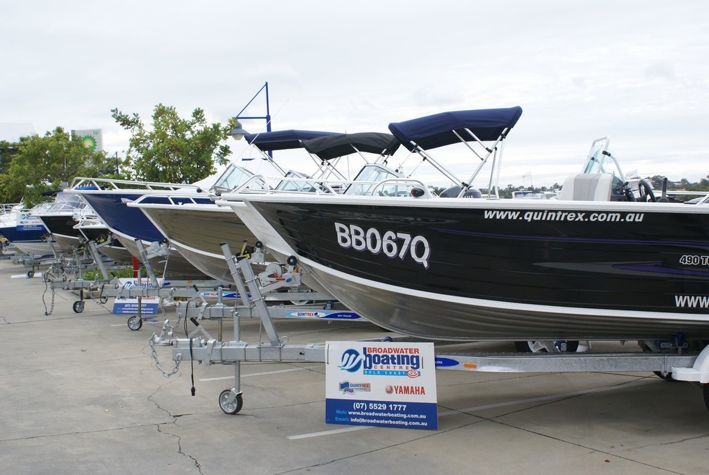 A line-up of ’tinnies’ at the Gold Coast City Marina’s Summer Boat Show. - hunting for customers © Bob Wonders