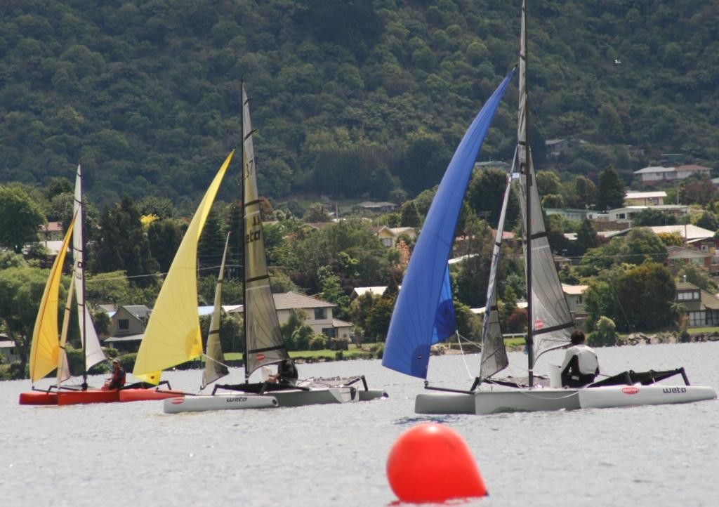 An intense three way downwind gybing duel in race 2 - 2009 Ronstan NZ Weta Championship photo copyright Chris Kitchen taken at  and featuring the  class