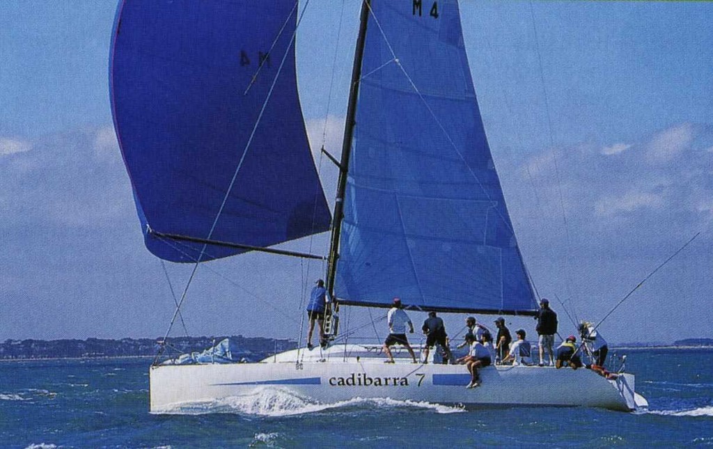 'Cadibarra' racing to Geelong. Nigel is helming, standing at the rail with the tiller extension. - Heemskirk Consolidated Melbourne to Hobart - photo ©  John Curnow