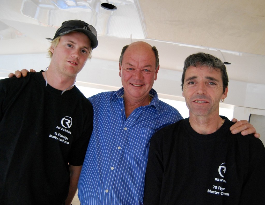 Aboard the Riviera 70, apprentice Clayton Pont (left) and plumber Ted Groombridge (right) discuss the “wow factor” with owner Peter Teakle. © Riviera . http://www.riviera.com.au