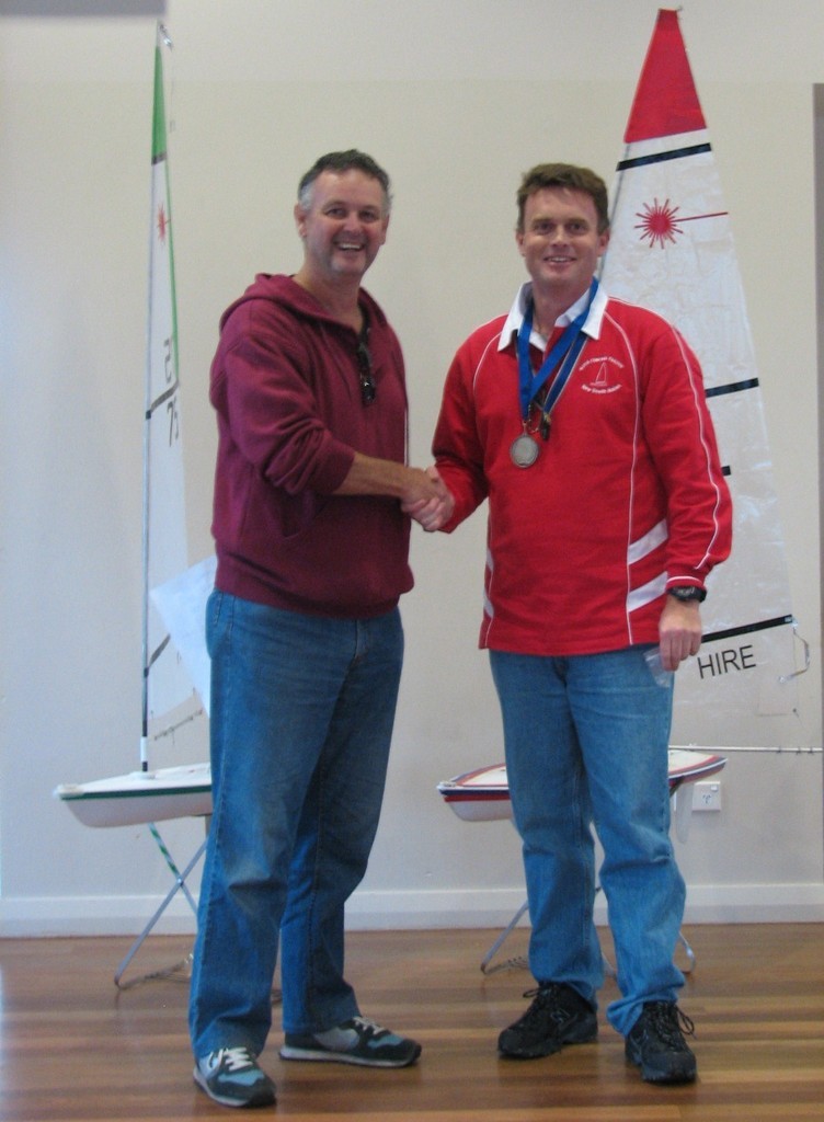 Greg Shore, Commodore of Dobroyd Aquatic Club presenting Paul Derwent (r) with his gold medal - 2009 NSW RC Laser State Championship photo copyright Cliff Bromiley www.radiosail.com.au http://www.radiosail.com.au taken at  and featuring the  class