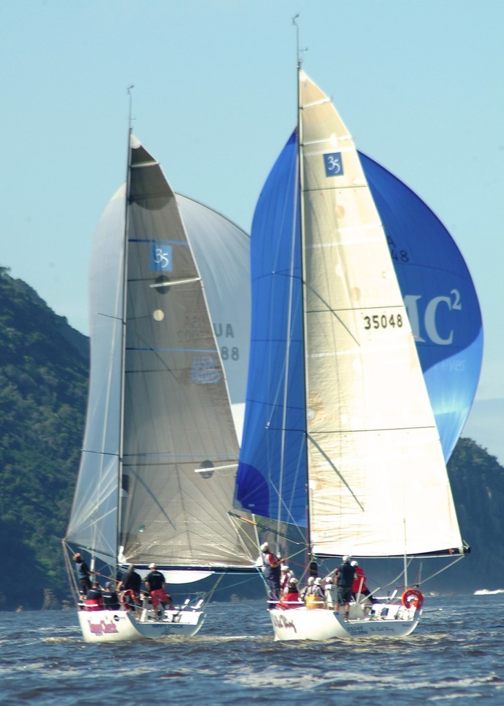 Sunshine and kites flying as the Port Stephens Trophy Fleet head towards Mt Tomaree - Sail Port Stephens  © Kirk McLean