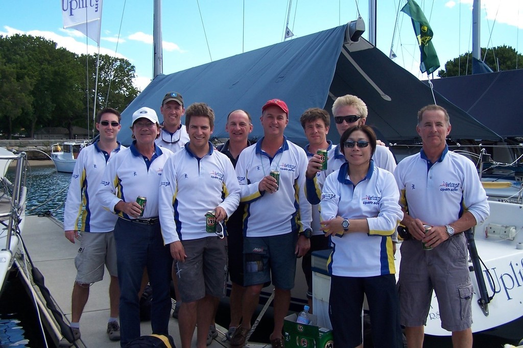 Skipper Darryl Hodgkinson (second from left), tactician Sean Kirkjian (red cap) and the crew of Uplift - Rolex Trophy One Design Series photo copyright SW taken at  and featuring the  class