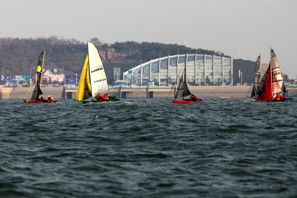 Close racing - Qingdao Weta Sailing - 2009 Autumn Regatta photo copyright SailWeta Jeppe Mortensen taken at  and featuring the  class