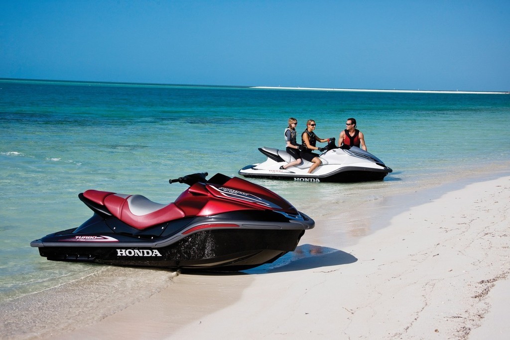 The GPScape (nearest camera) and the standard version take a break on a picturesque spit. © Lisa Evans