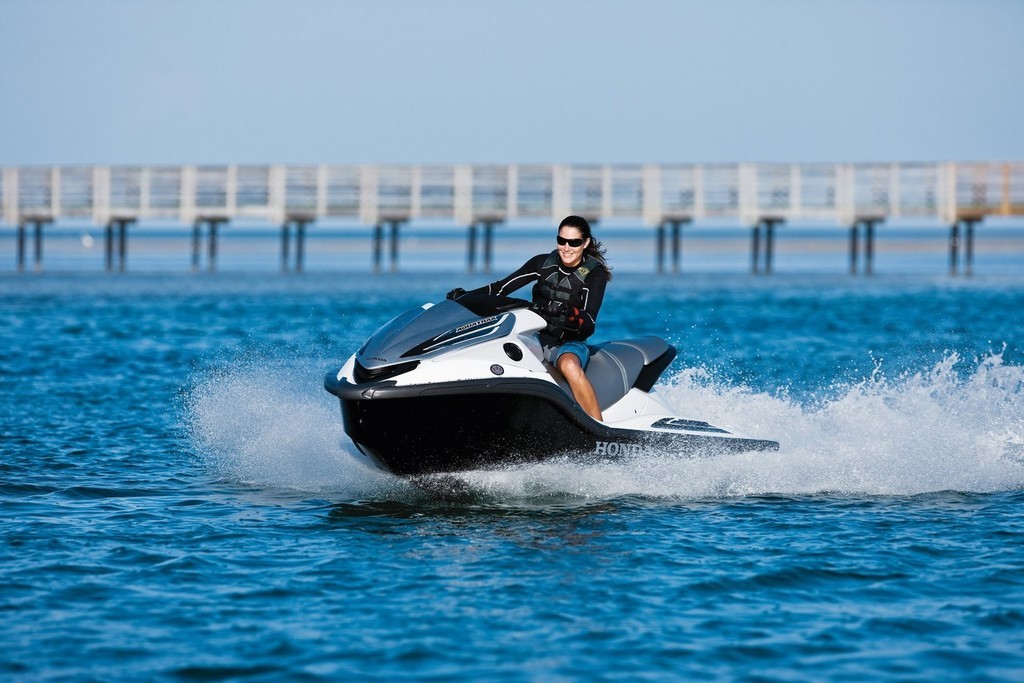 Is riding a PWC fun? Any doubts, look at the smile on the young lady’s face. © Lisa Evans