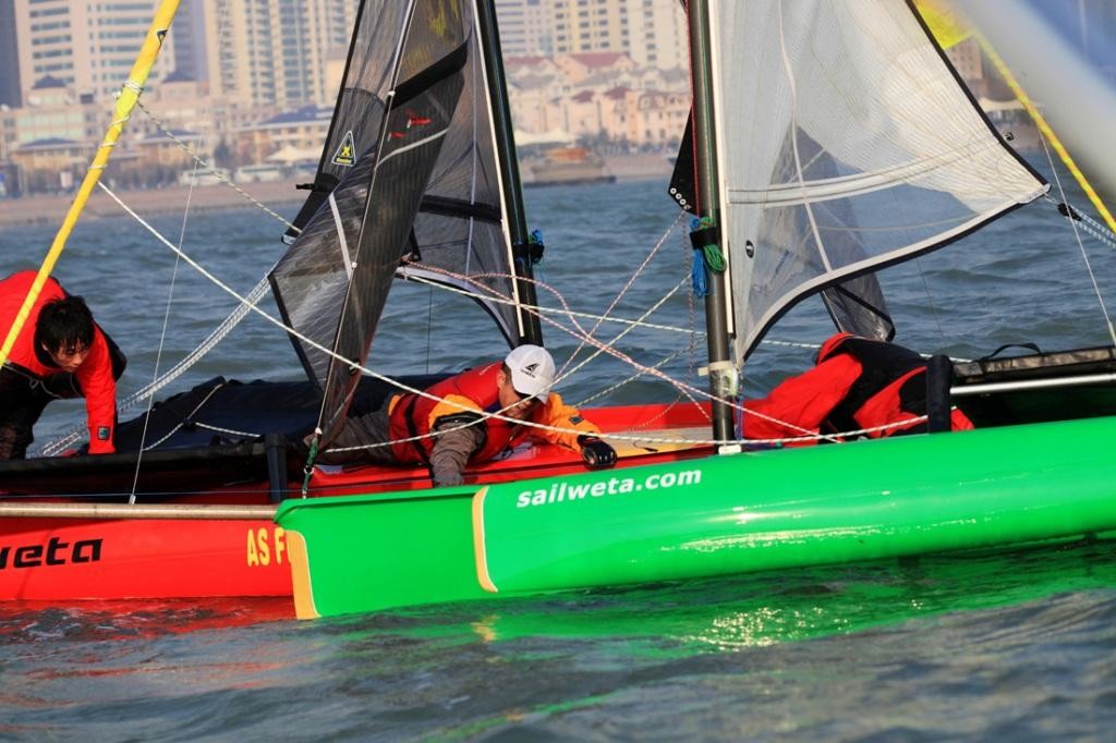 Collision! - Qingdao Weta Sailing - 2009 Autumn Regatta photo copyright SailWeta Jeppe Mortensen taken at  and featuring the  class