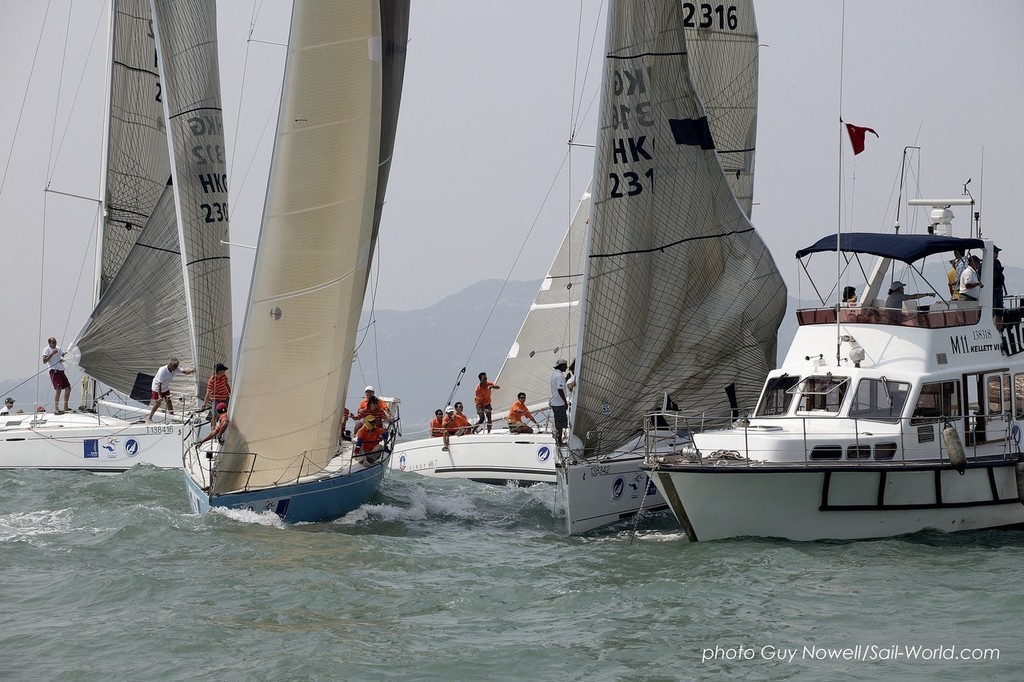 Oops! Wrong side of the Committee Boat! China Cup International Regatta &copy; Guy Nowell http://www.guynowell.com