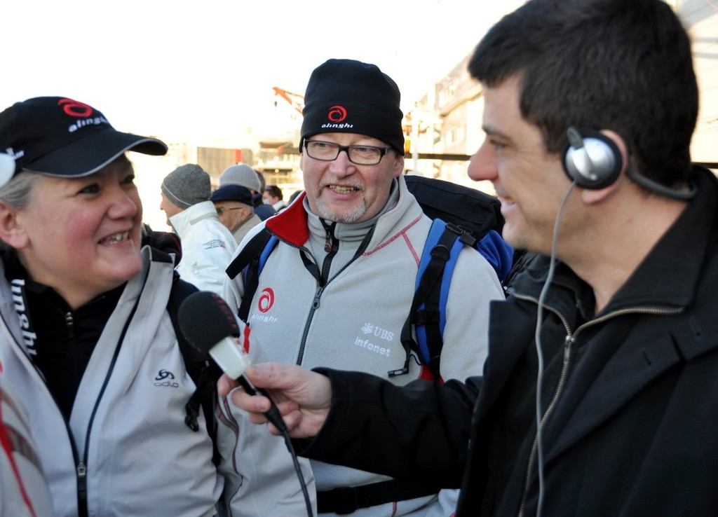 Swiss radio reporter taking the temperature. © Jean Philippe Jobé