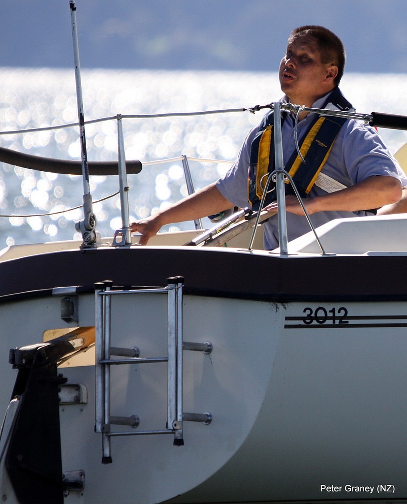 Matthew Chao B1( totally blind) faces into the wind to judge the breeze on day three of the 2009 IFDS World Blind Sailing Championship on Lake Rotorua, 19th Marc, 2009 - 2009 IFDS World Blind Sailing Championship. © peter graney